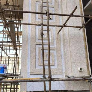 本溪 黄金麻花岗岩别墅外墙干挂回纹造型效果