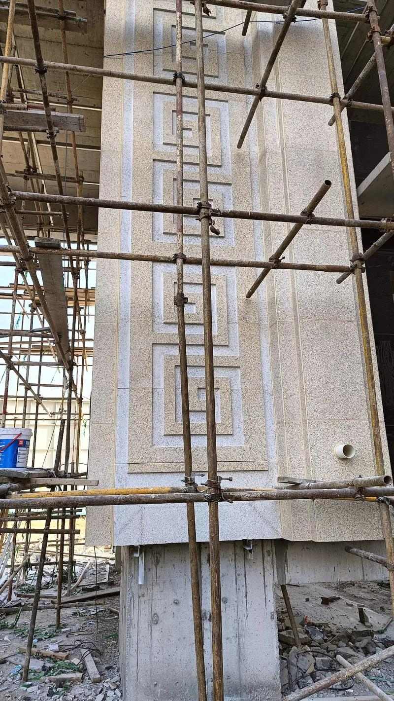 本溪 黄金麻花岗岩别墅外墙干挂回纹造型效果